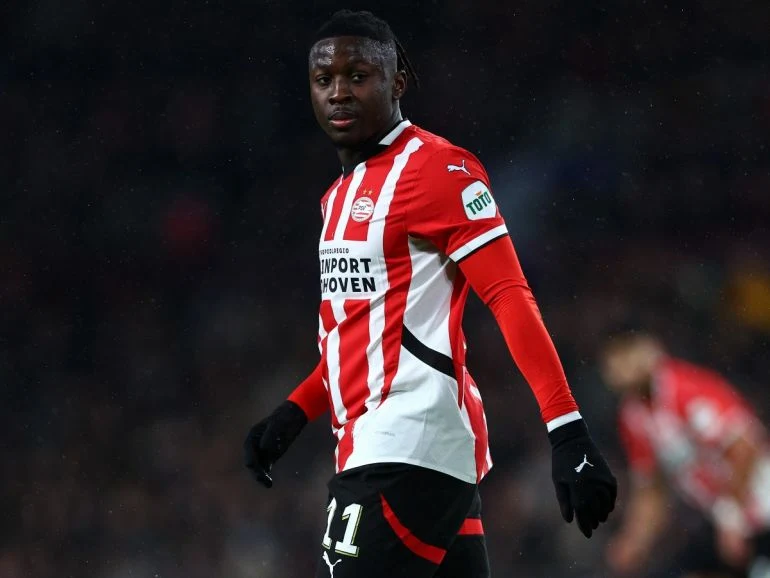 Liverpool and Arsenal Intensify Battle for PSV Winger