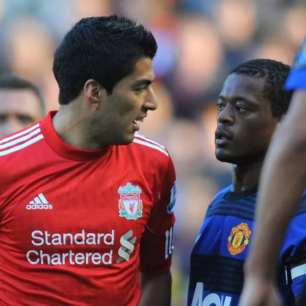 Evra Challenges Suarez to MMA Bout in Paris Debut