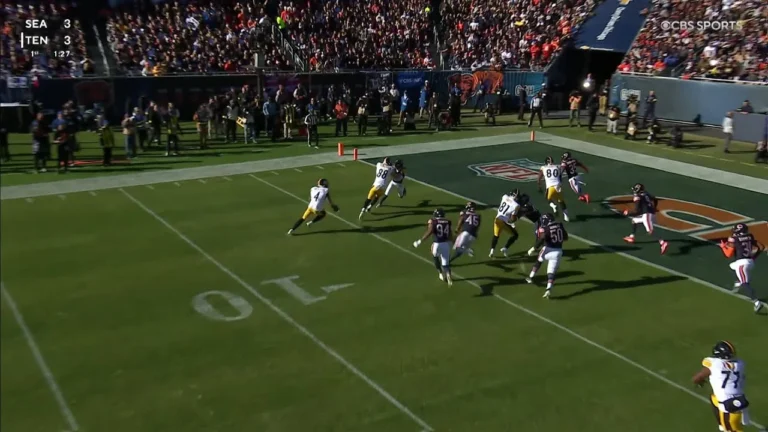 DK follows his convoy of blockers on TD