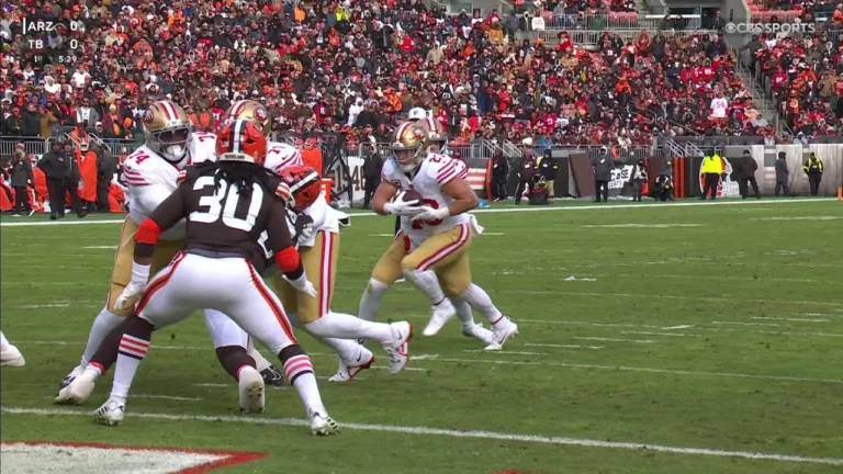 Christian McCaffrey punches itnto the endzone