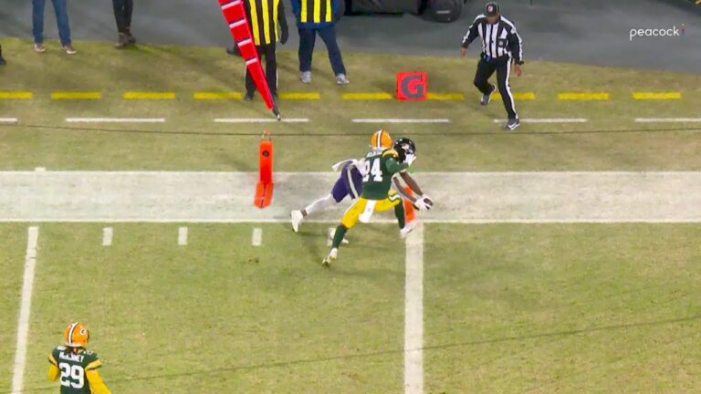 Zay Flowers extends for a Ravens’ TD