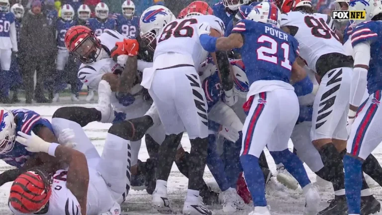 Chase Brown pushes the pile for a Cincy TD