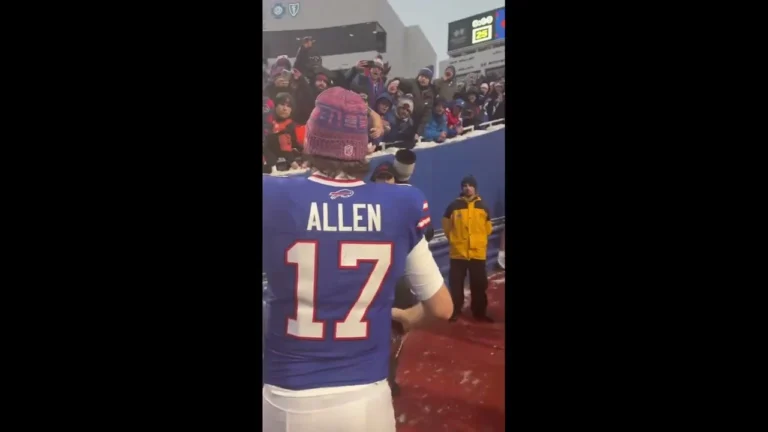 Josh Allen celebrating with Bills Mafia and giving kid a game ball after win over Broncos