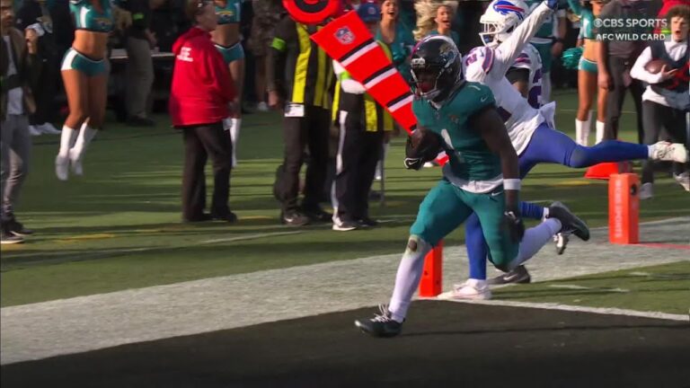 Lawrence tosses it up to Etienne for a TD