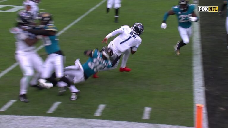 Ward scrambles for the endzone on a Titans’ TD