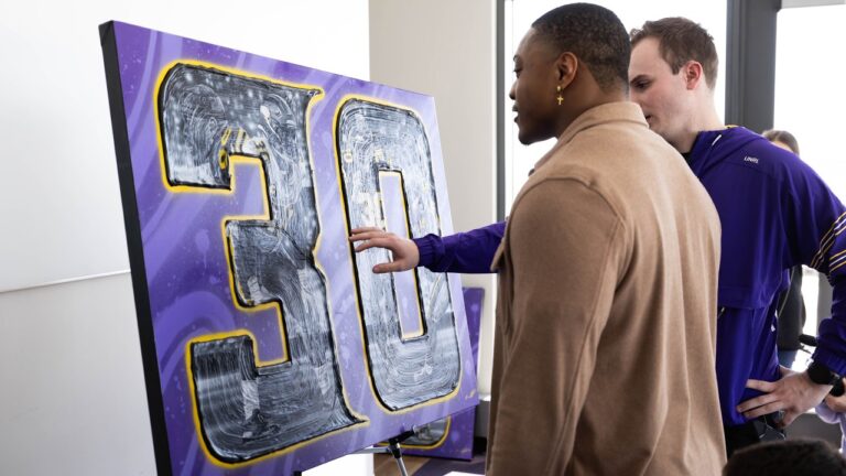 Local Artist Creates Custom Paintings for Vikings Legends Adam Thielen & C.J. Ham’s Retirements